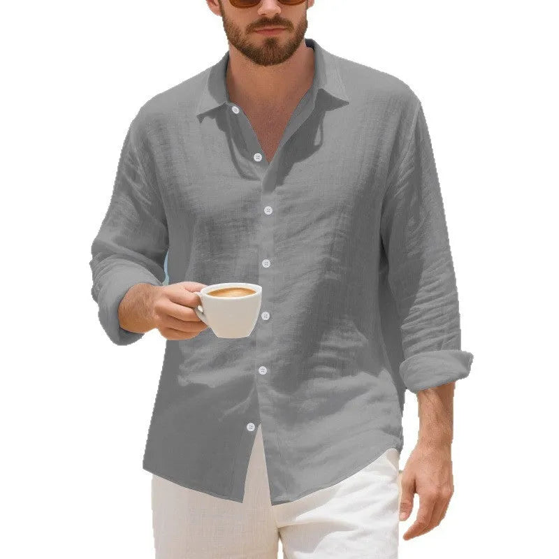 Man wearing a loose-fit light blue linen casual shirt with a non-iron finish.