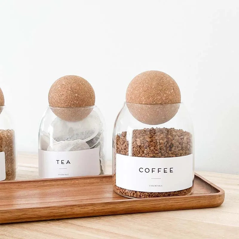 Set of three transparent spherical glass storage tanks with round single-layer design for general food storage