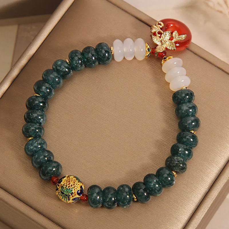 Blue water jade and red agate peace buckle crystal bracelet for women.