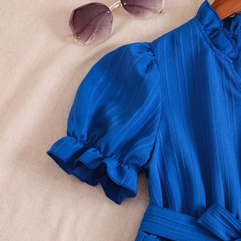Girls' blue V-neck puff sleeve lace-up dress with A-line skirt and cotton blend fabric, summer style.