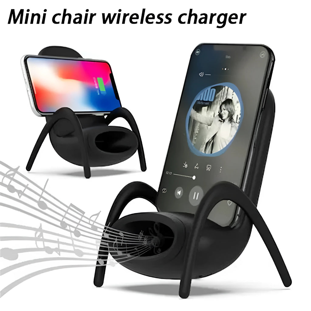 White mini chair shaped wireless charging stand holding a mobile phone on a desk.