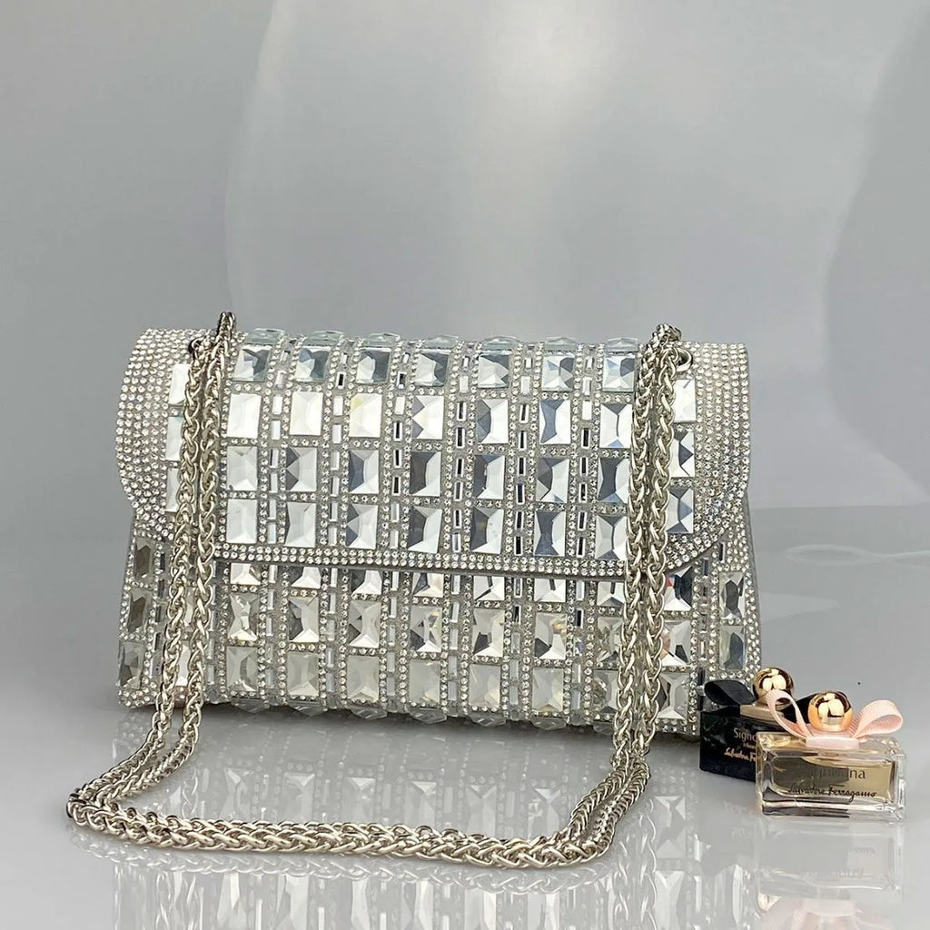 Glass rhinestone chain clutch bag in horizontal square shape with decorative diamonds and chain strap