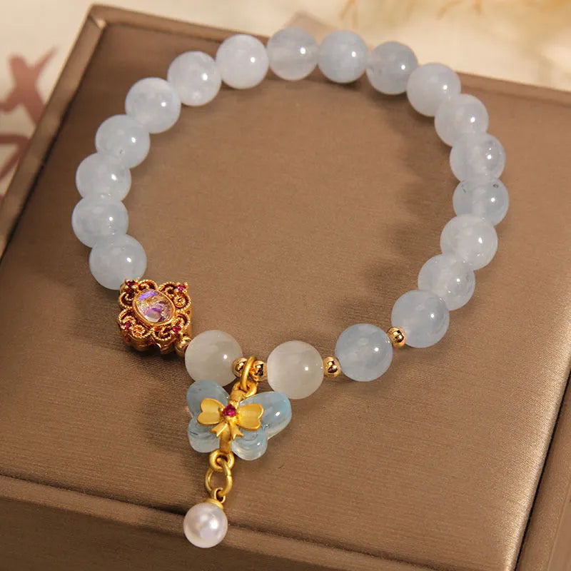 Women's aquamarine butterfly pendant bracelet with crystal rhinestones and decorative butterfly charm