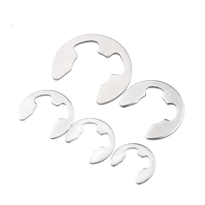 E-type snap spring M4 size in natural colour 304 stainless steel, shown isolated on white background