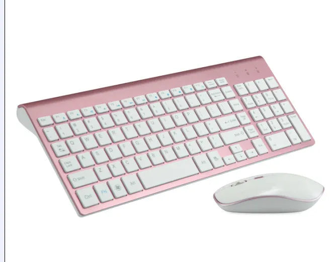 Wireless keyboard and mouse set in grey with ultra-thin 104-key layout and USB receiver on a desk