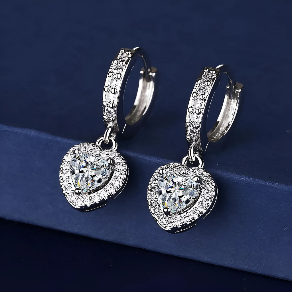 Copper inlaid zircon love earrings for women, heart shape, white gold colour, Korean style with polka dot detail.