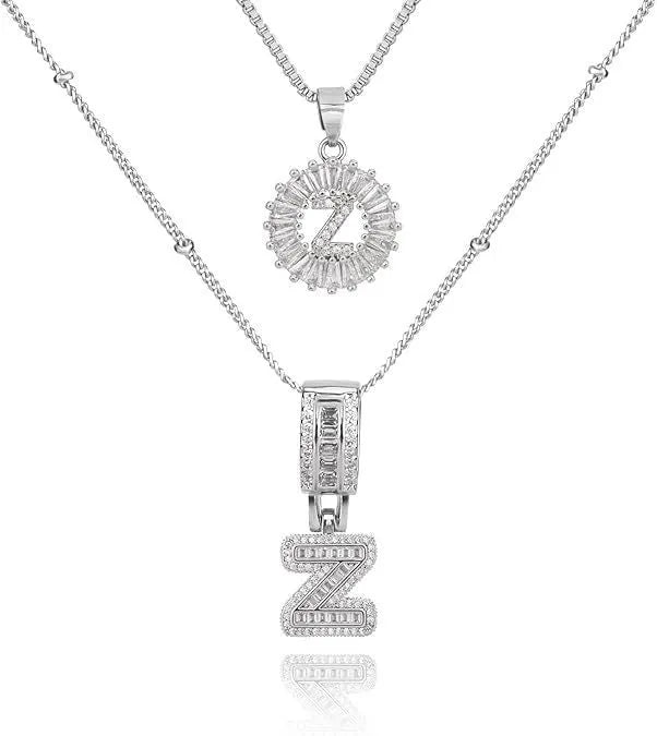 26 English letters copper-plated gold diamond initial pendant necklace with adjustable chain on display