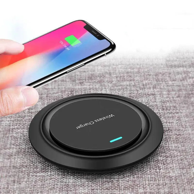 Round white desktop wireless phone charger with 10W fast charging capability