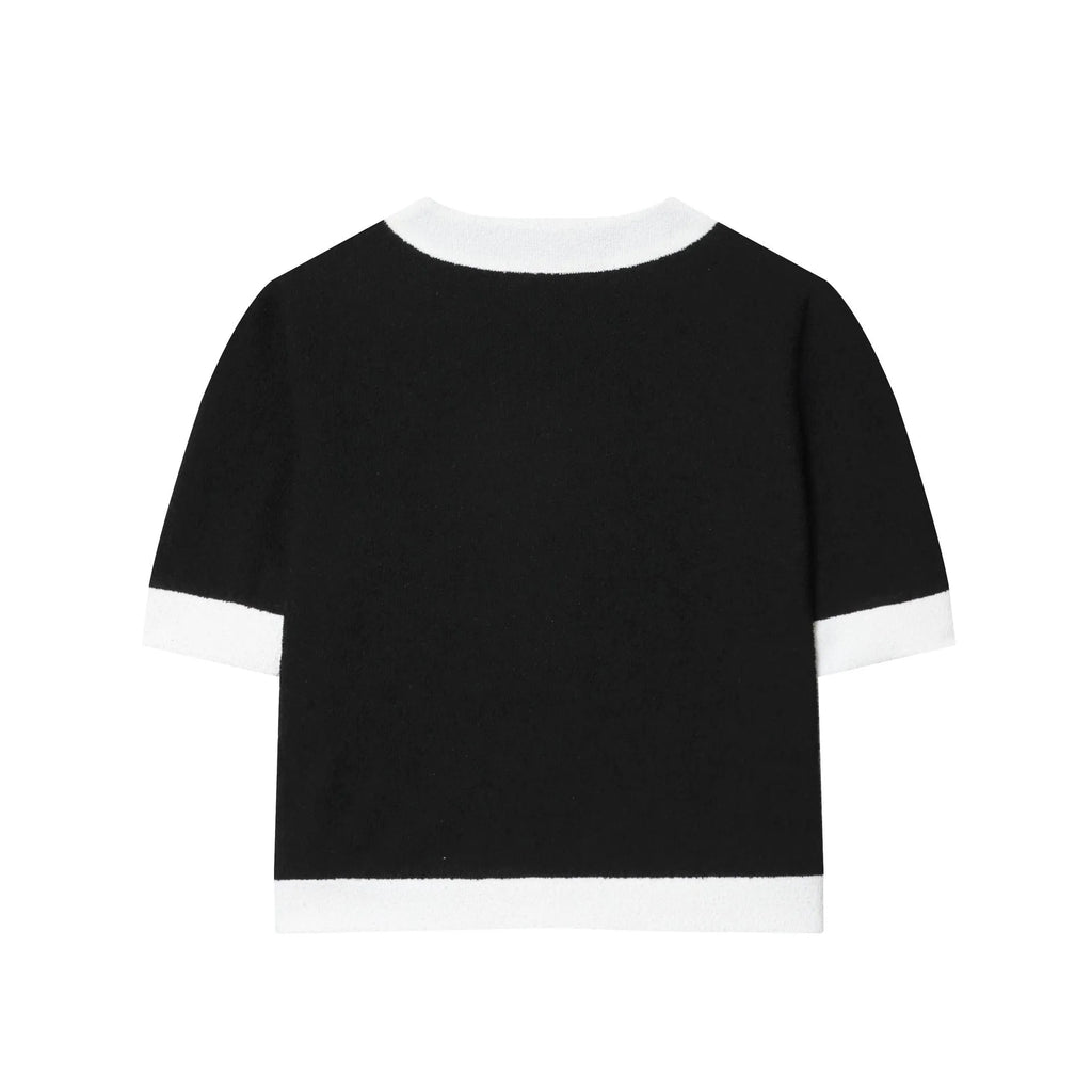 Women's beaded leather detail top and high-waisted stretch trousers suit set in street fashion style.