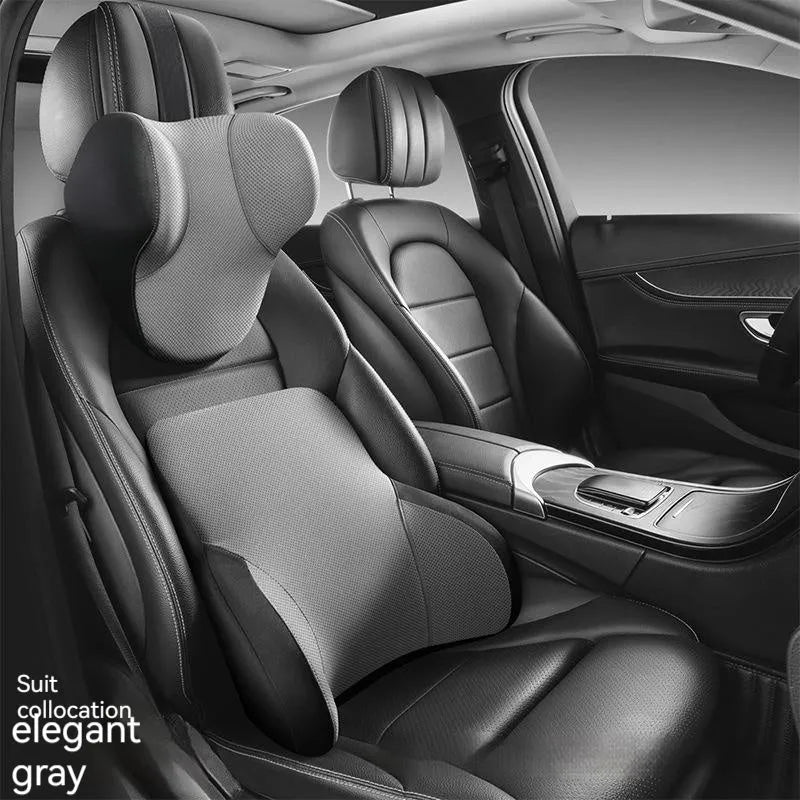 Black memory foam car headrest and lumbar support pillow set on a car seat
