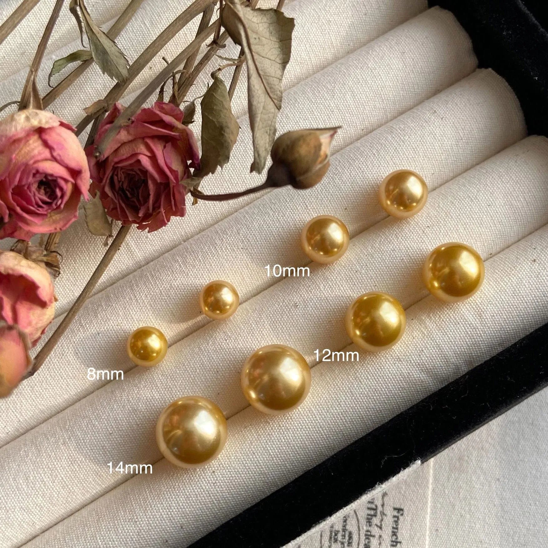 Retro geometric pearl stud earrings for women with an eight-point star design on silver setting.