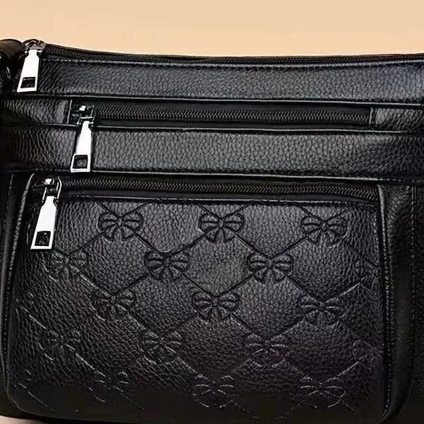 Butterfly black women's PU leather messenger bag with embossed texture and horizontal square shape
