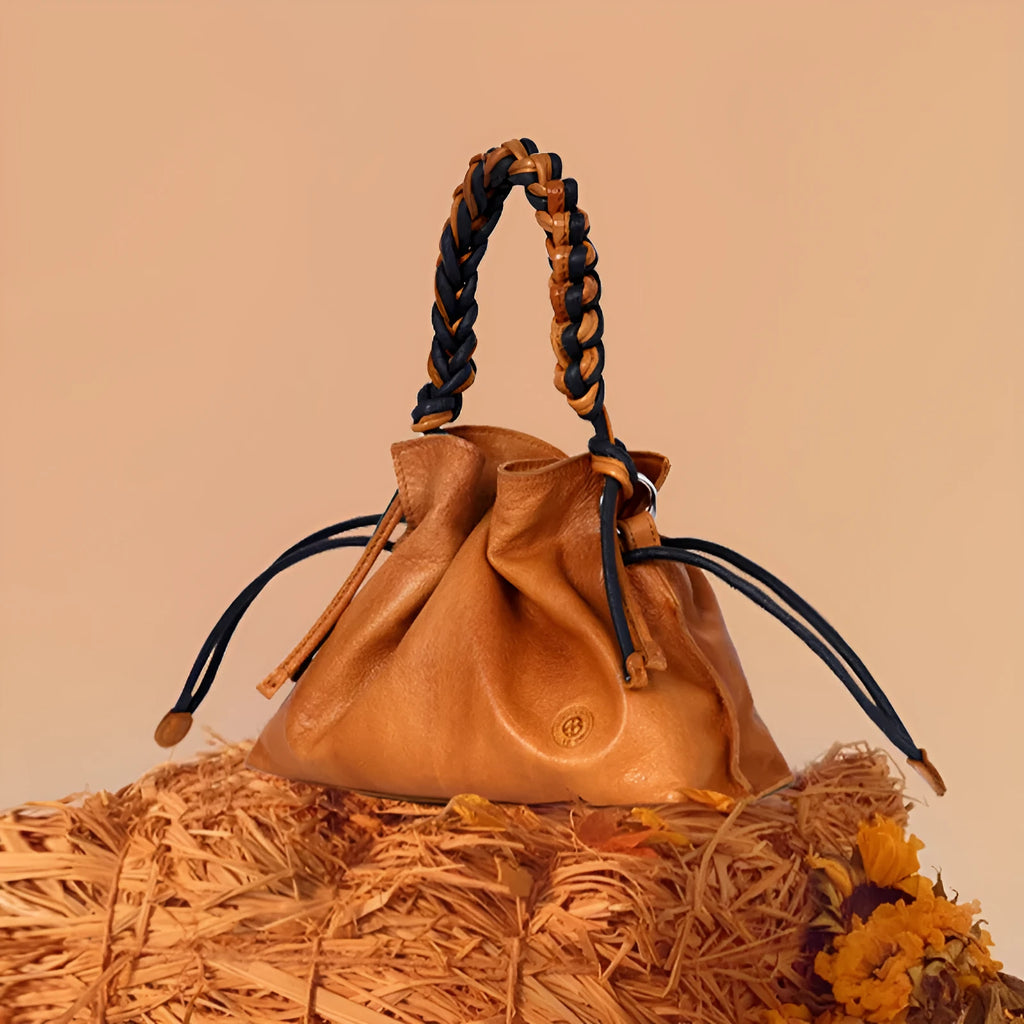 Woven genuine leather women's crossbody bag in light yellow or orange with zipper hidden pocket and polyester cotton lining