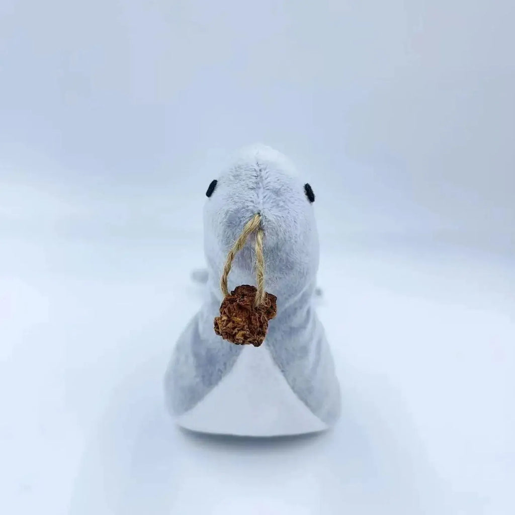 Blue sea lion shaped plush cat toy with bell, teeth grinding texture, catnip and gall fruit.