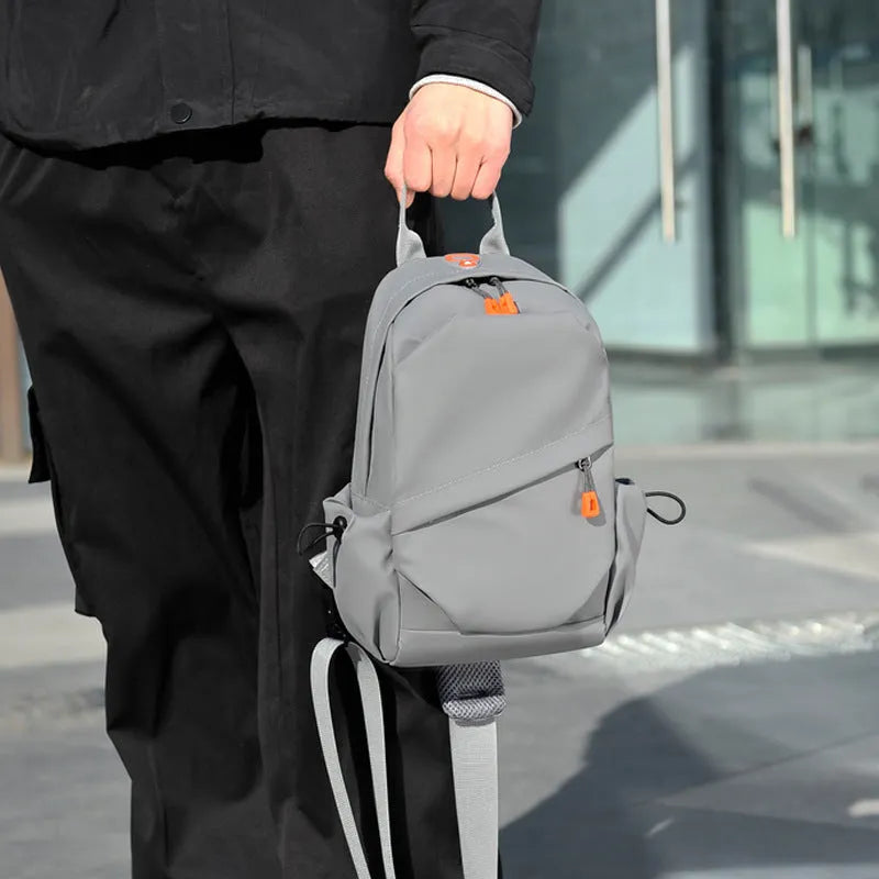 Men's black polyester crossbody bag with waterproof material and minimalist design