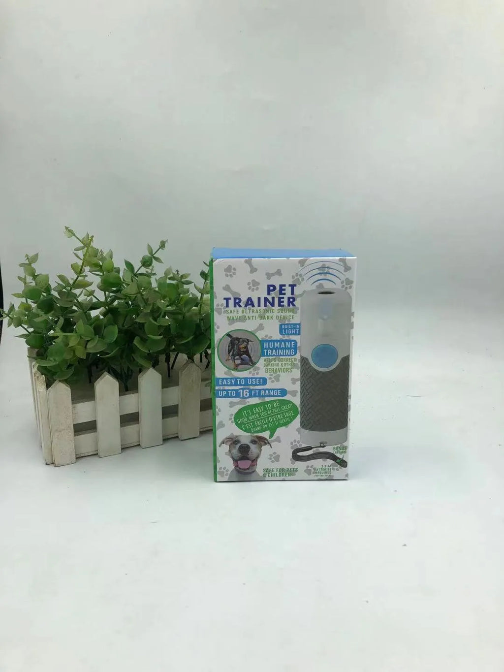White ABS plastic handheld ultrasonic dog trainer for bark control with battery operation