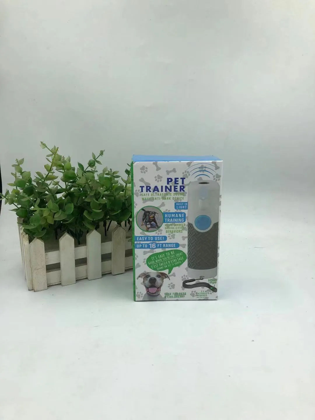 White ABS plastic handheld ultrasonic dog trainer for bark control with battery operation
