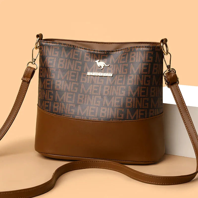 Retro brown soft leather messenger bag with organised compartments and three-dimensional external pocket