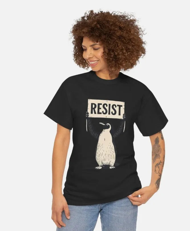 Straight cut loose fit cotton t-shirt in black on a hanger, showing round neck and short sleeves.
