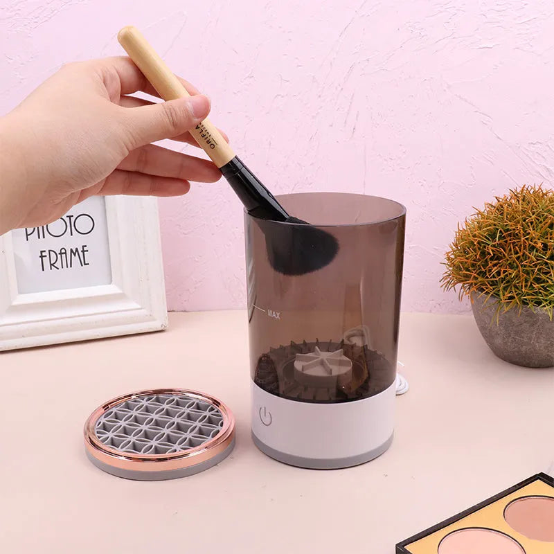 Grey and white electric makeup brush cleaning device with USB charging port