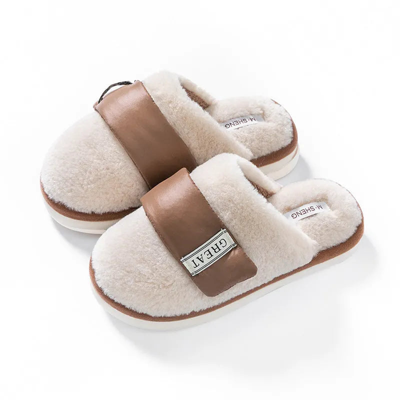 Women's beige plush floor slippers with round toe, flanging detail, and textured plastic sole.