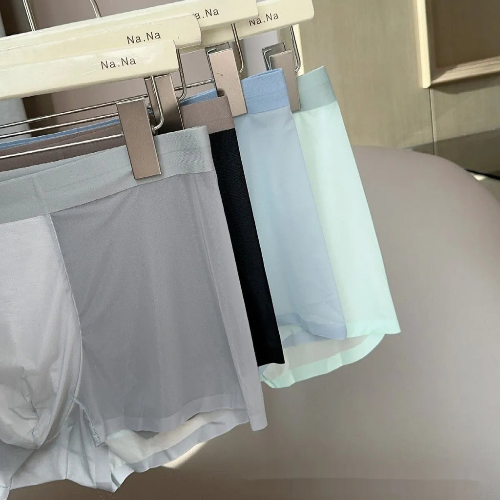 Ultra-thin nude colour men's seamless boxers with honeycomb crotch design on a white background