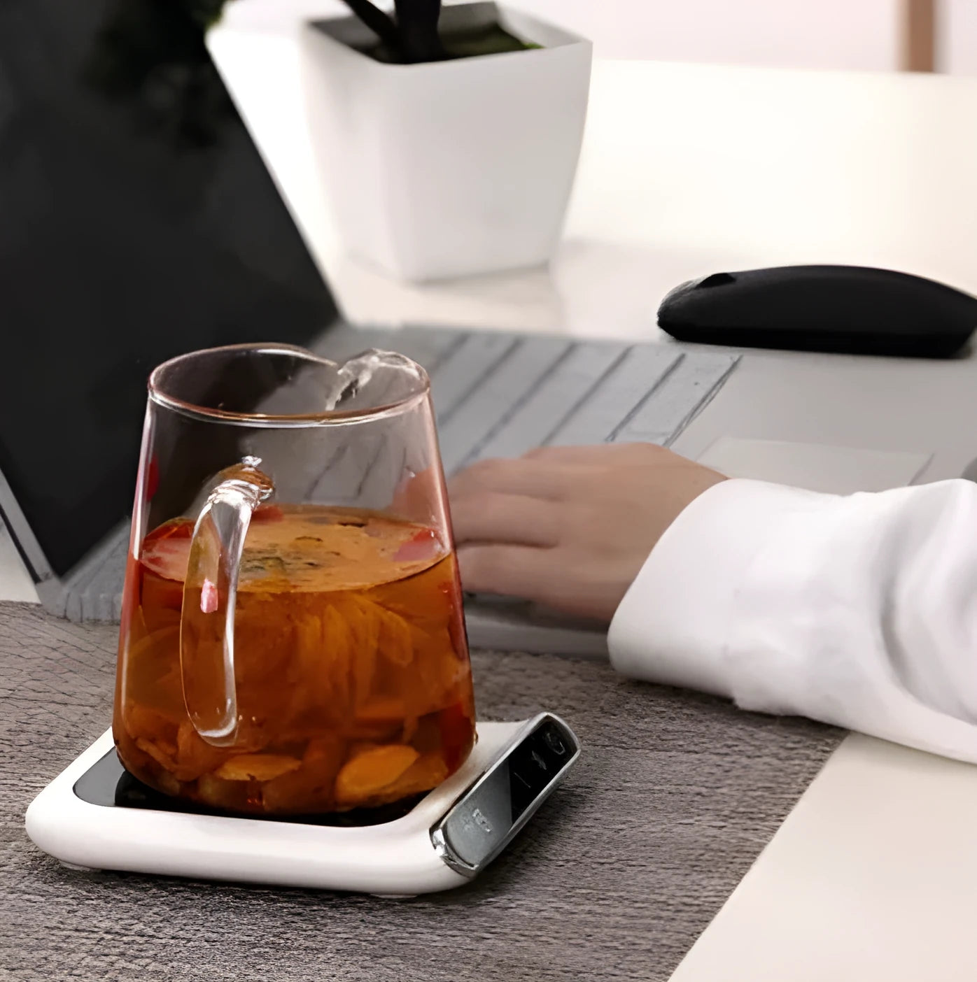 Black USB-powered cup warmer with heating coaster for beverages
