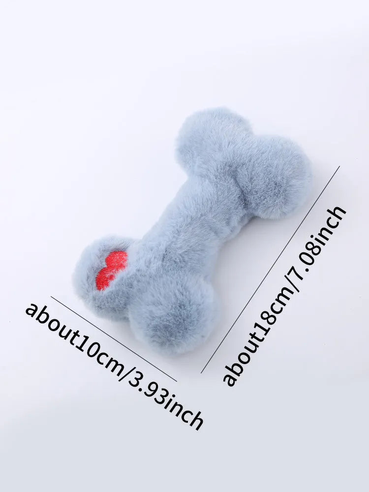 Blue love bone plush dog toy with vocal sound unit and squeaker for interactive chewing play.