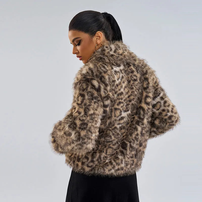 Women's leopard print coat with a buckle lapel front, shown in street fashion style