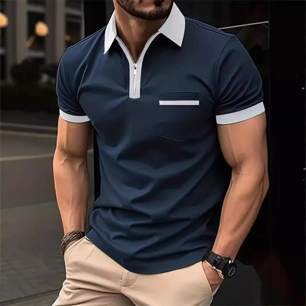 Man wearing a loose fit casual short sleeve shirt with a chest pocket and zipper decoration.