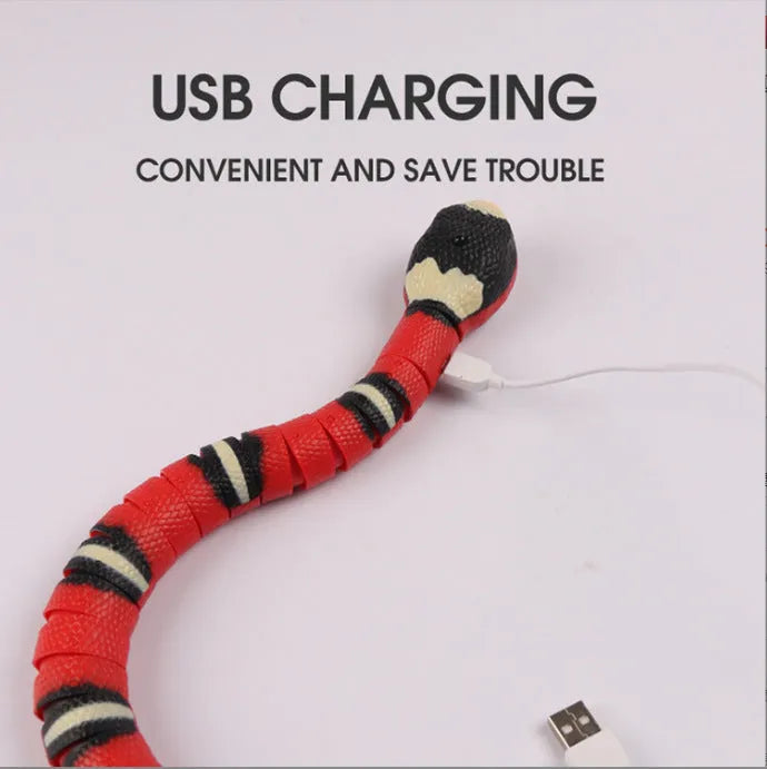 Interactive electric induction snake cat toy with S-shaped crawling and flashing eyes on a carpet