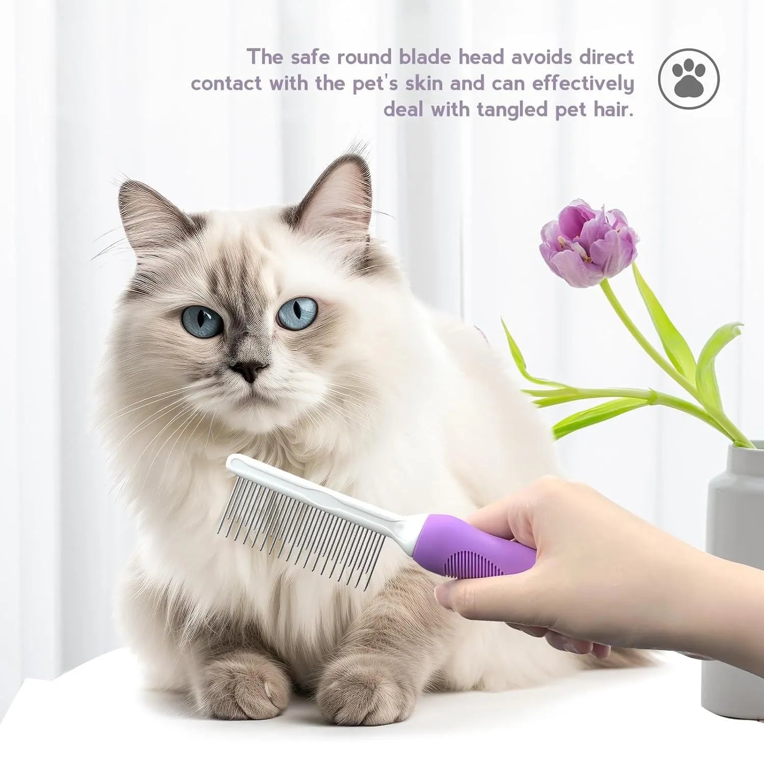 Purple pet detangling comb with stainless steel teeth on a 27cm long ergonomic handle.
