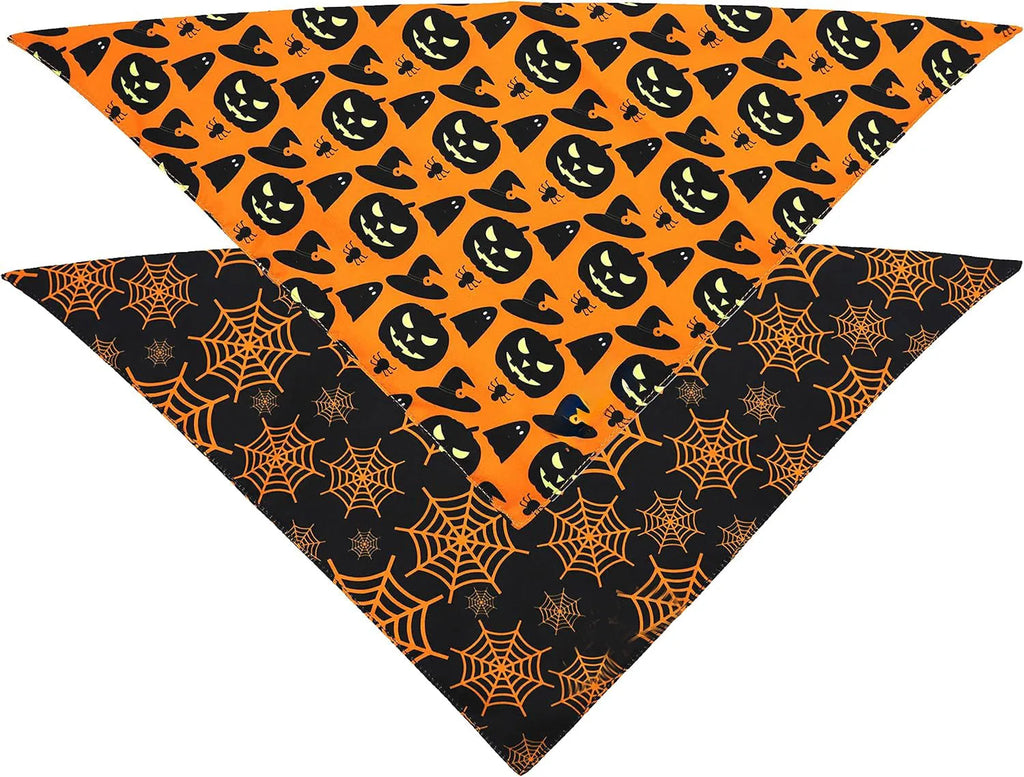 Reversible Halloween dog bandana with pumpkin and spider web patterns in black and orange