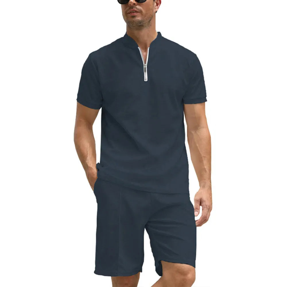 Men's solid colour polo shirt and trouser two-piece suit set in beaded bird's eye polyester fabric.
