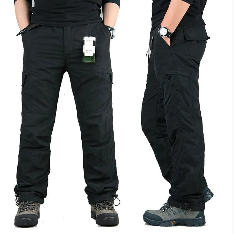 Men's khaki cotton velvet overalls with wool lining, shown with a loose straight-leg fit.