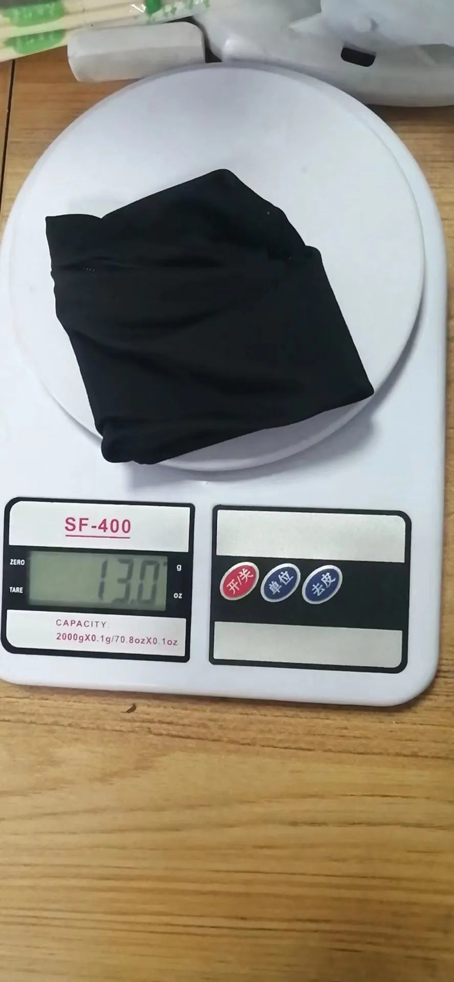 Wrist bag armband sleeve showing 10cm by 10.5cm phone compartment and protective packaging.