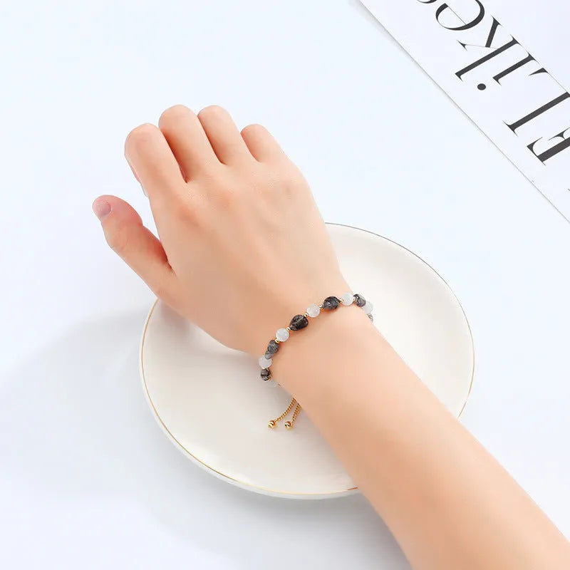 Women's polished crystal and opal natural stone bracelet in amethyst colour