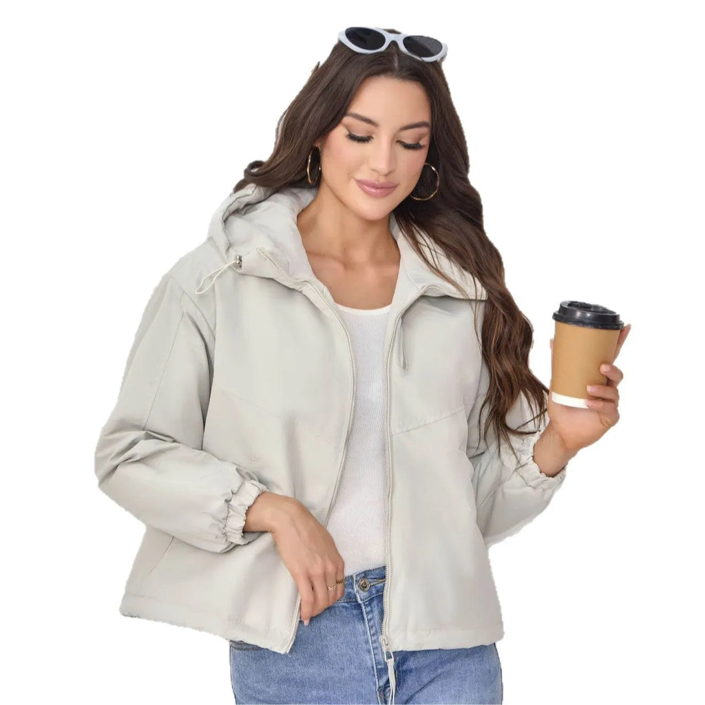 A woman's loose-fit hooded jacket in solid-colour polyester, shown in grey.