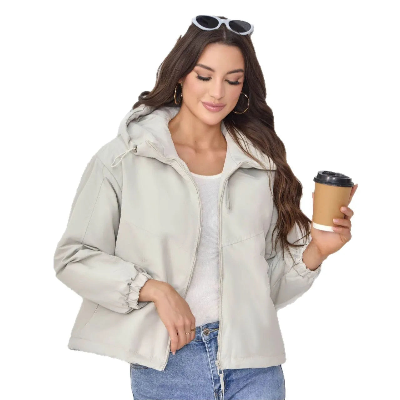 A woman's loose-fit hooded jacket in solid-colour polyester, shown in grey.