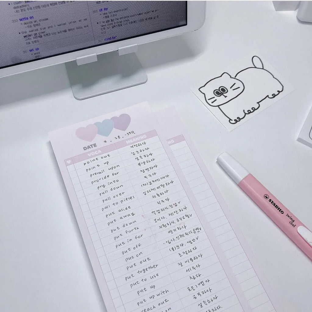 Vertical half-B5 notepad with English words, shown in pink, purple, and blue cover colour options.
