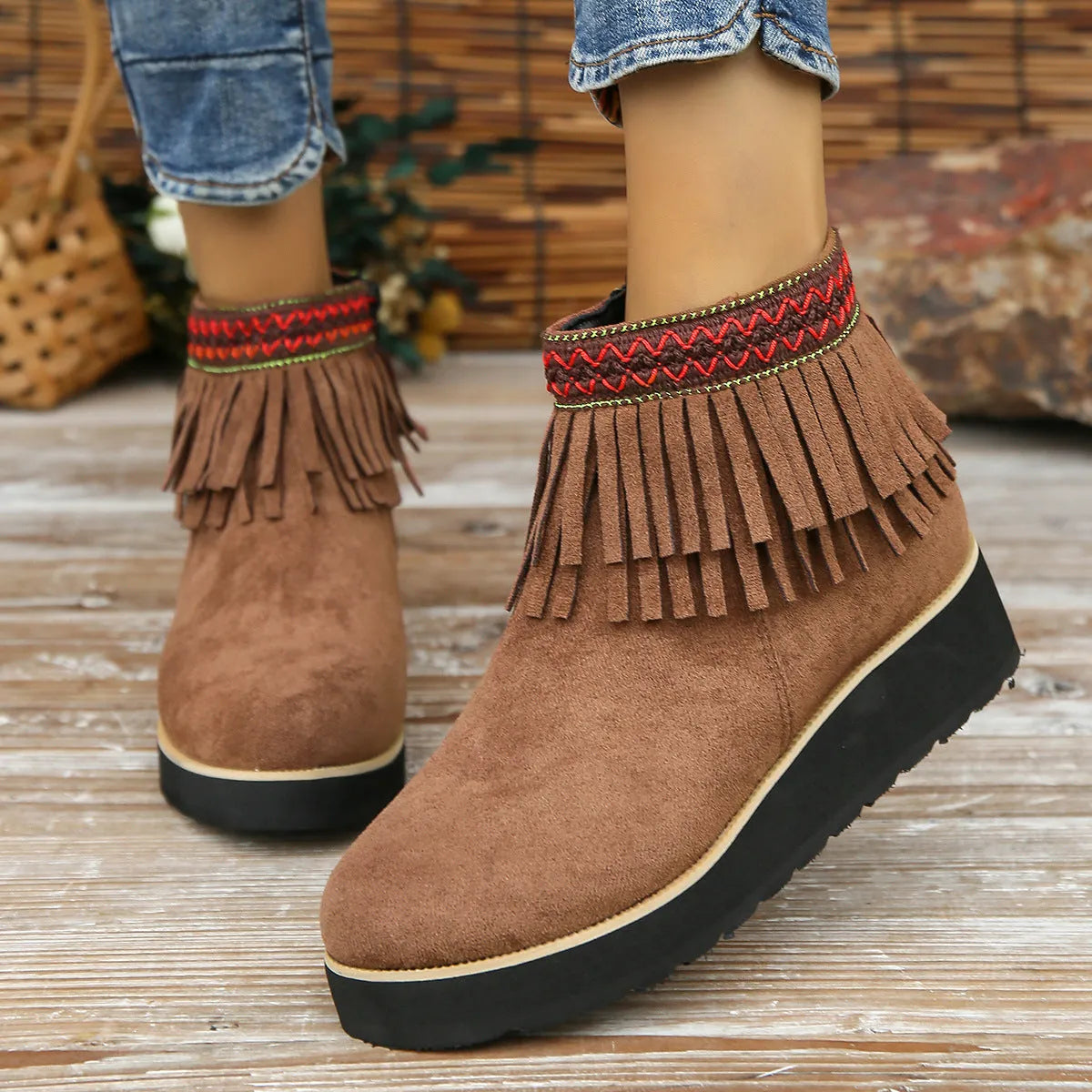 Women's suede wedge ankle boots in dark brown with a side zipper and thick rubber sole.