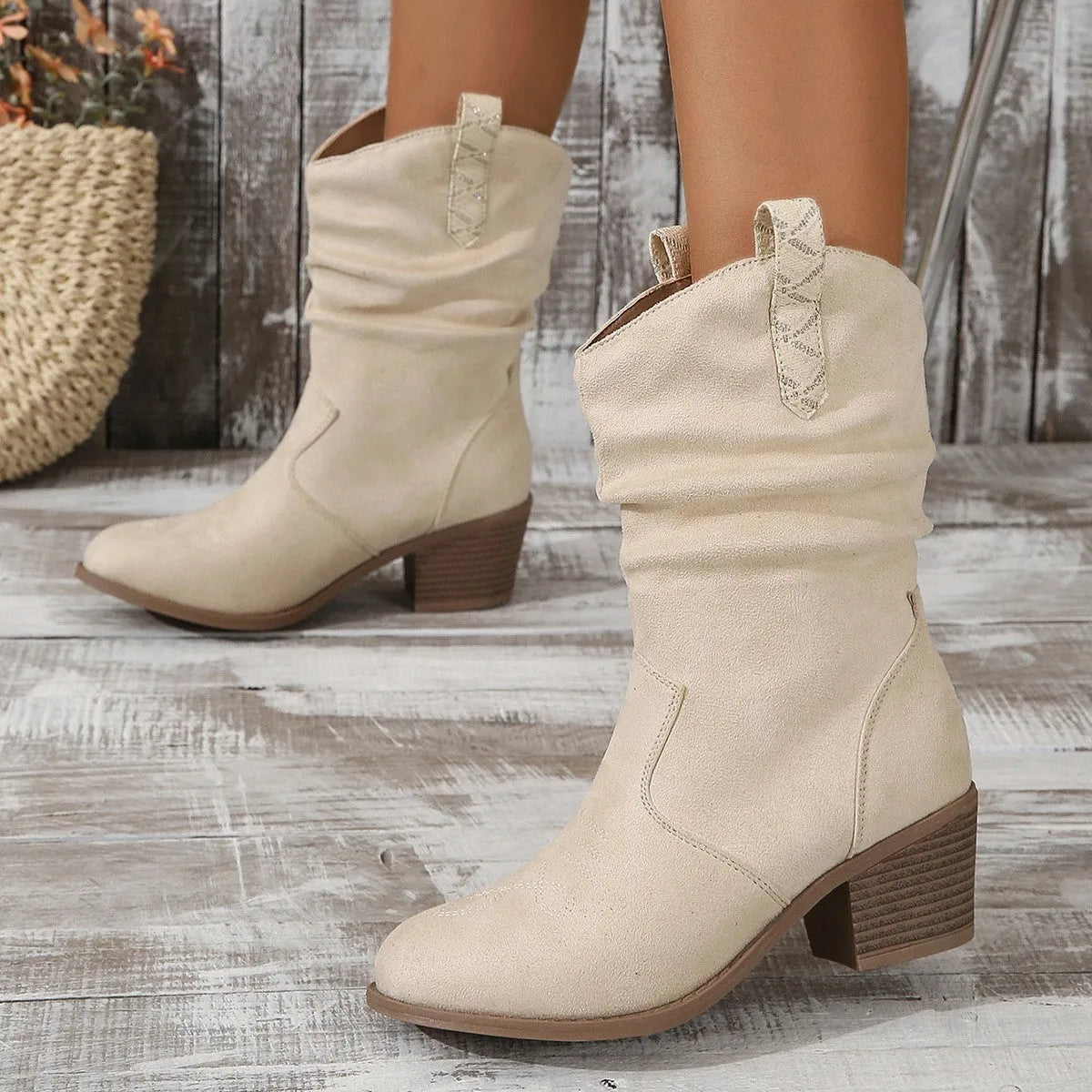 Women's suede mid-calf boots in lotus root colour with a block heel and leather stitching detail.