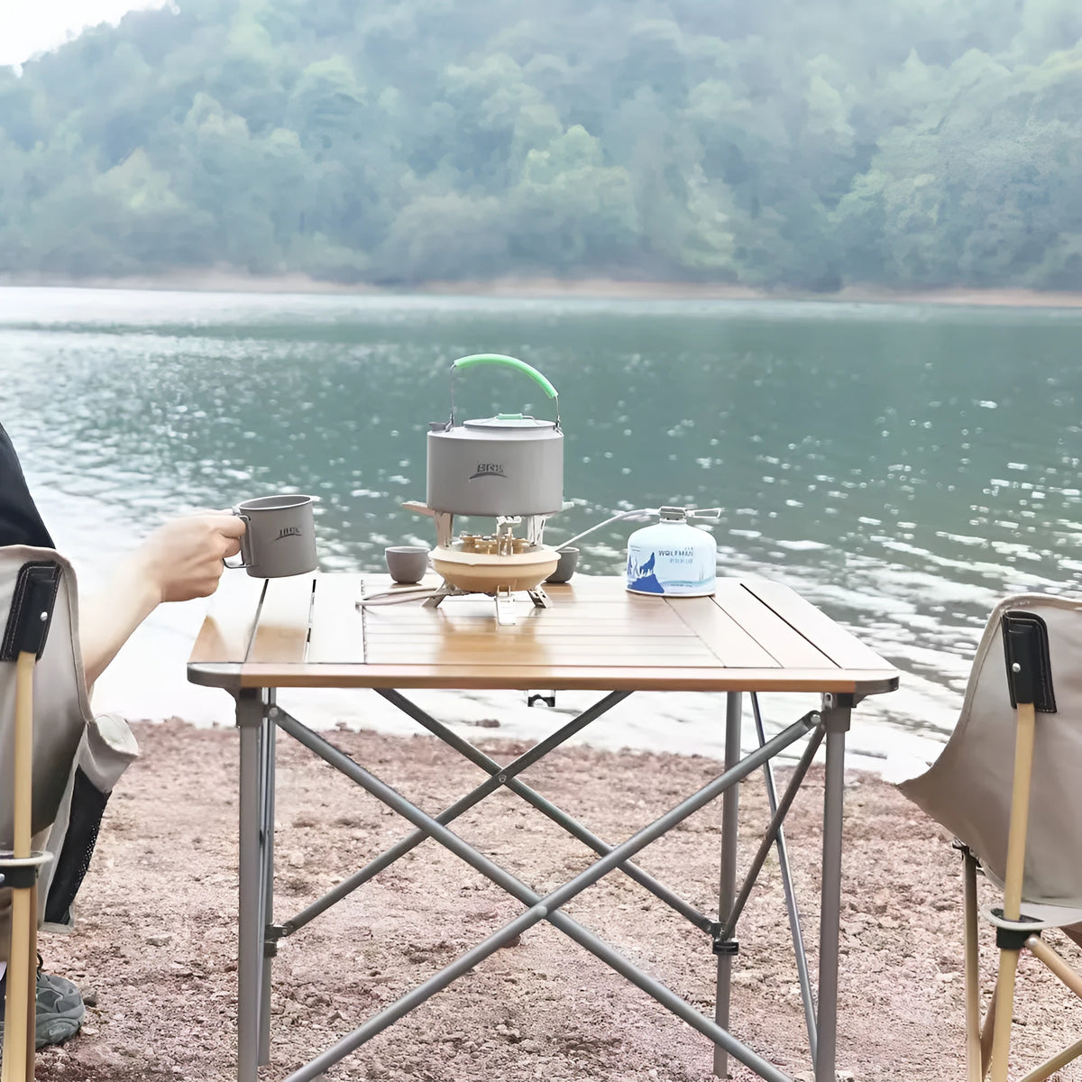 Portable windproof gas stove in black or khaki for camping and picnics, suitable for 1-2 people.