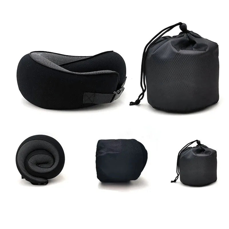 Navy blue memory foam U-shaped travel neck pillow rolled up next to its carry bag