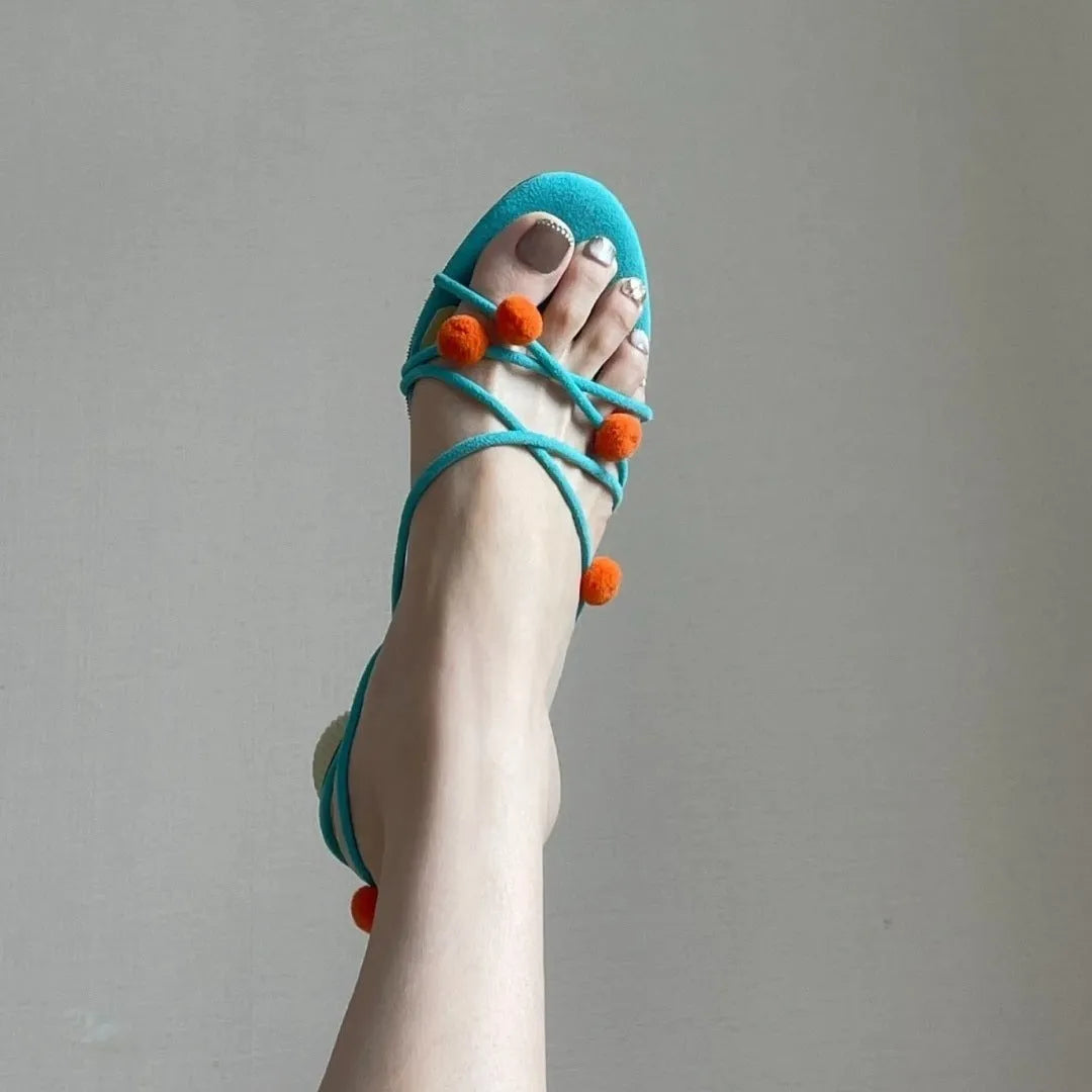 Cyan women's high-heeled sandals with lace-up straps, open toe, and thin straps made from French leather.
