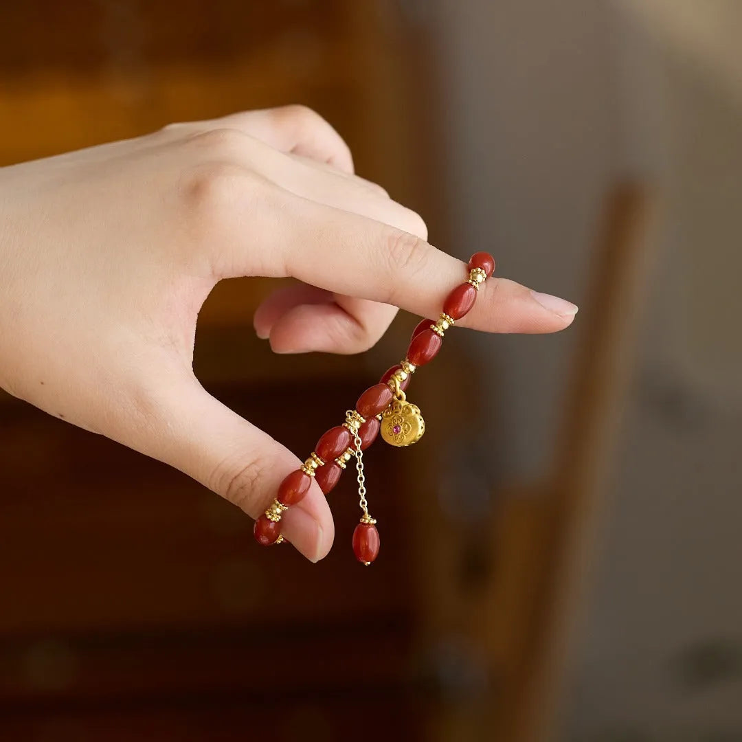 Natural red agate bracelet for women with handmade beads, geometric shape, and auspicious patterns in red agate fortune dumplings colour.