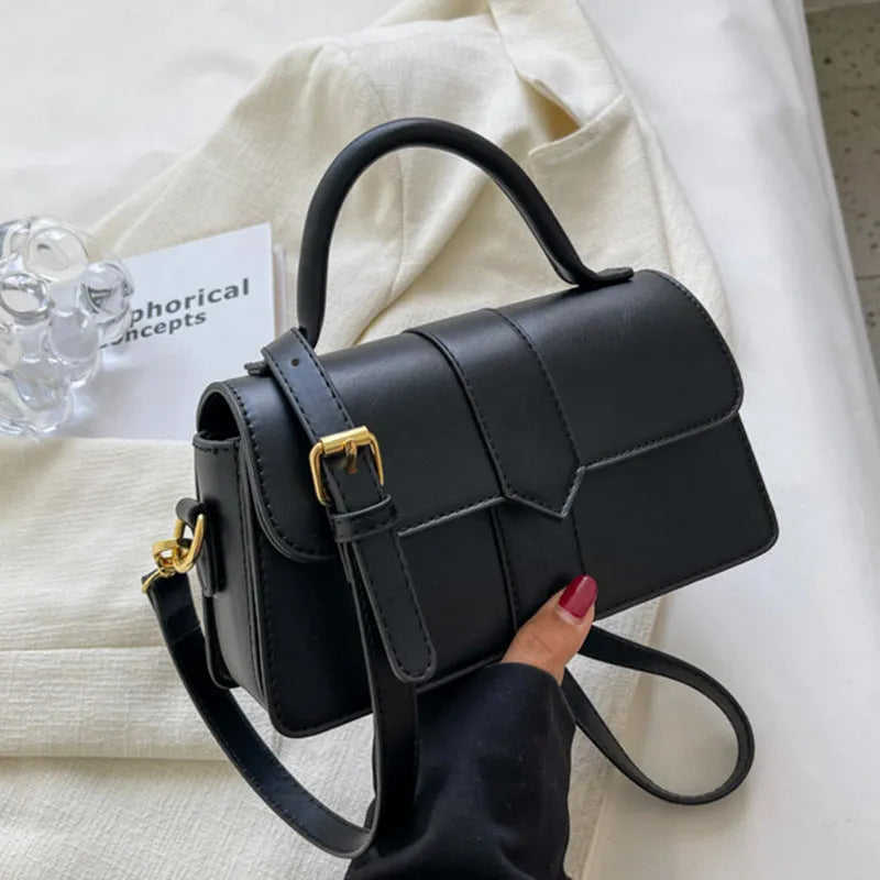 Women's horizontal square messenger bag in PU material with internal file organisation