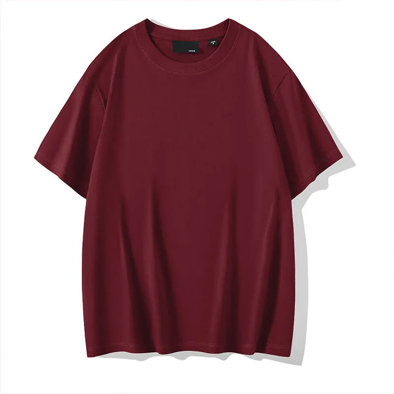Men's solid colour cotton T-shirt with round neck and drop-shoulder sleeves in loose casual fit