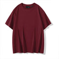 Men's solid colour cotton T-shirt with round neck and drop-shoulder sleeves in loose casual fit