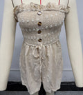 Women's sleeveless off-shoulder jumpsuit in polyester fabric showing blue colour option with button detailing